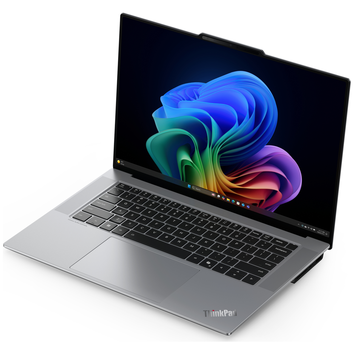 Een zilveren laptop met een kleurige abstracte achtergrond op het scherm.