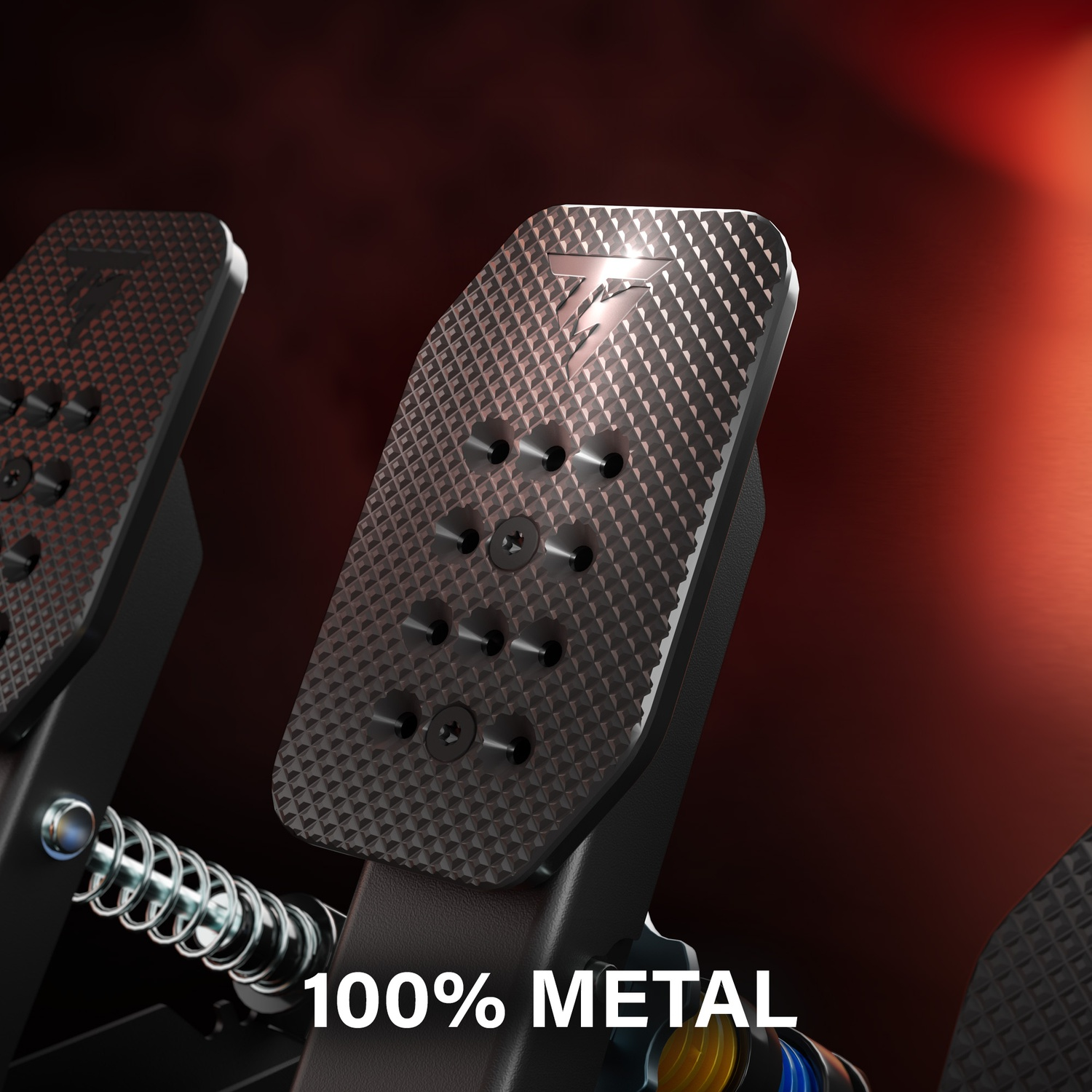 Close-up of metal pedals with diamond pattern and screws.