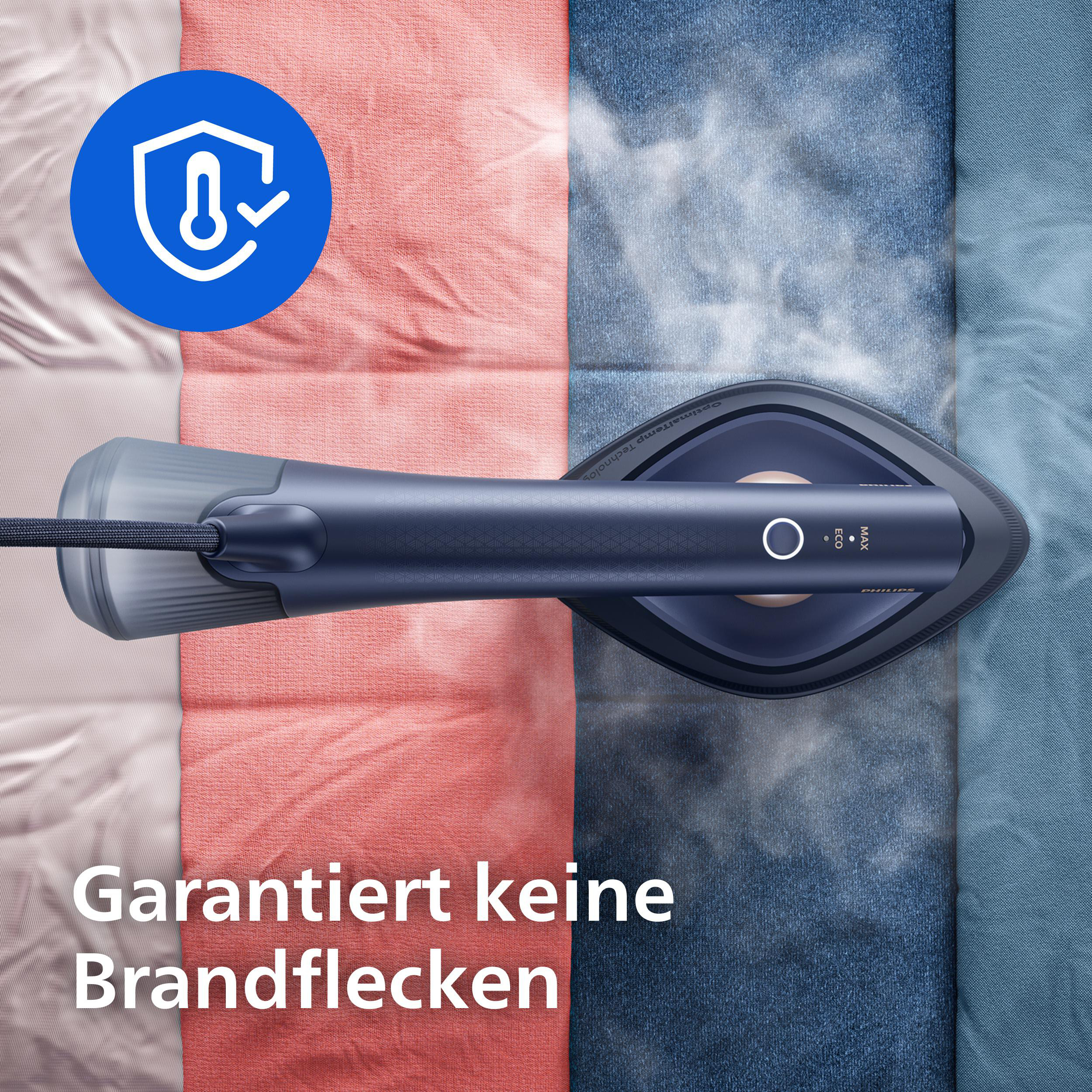 Dampfbügeleisen auf bunten Stoffen mit einem Schutz-Symbol.