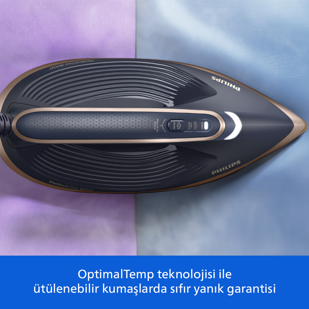 Mor ve mavi kumaş üzerinde altın vurgulu, koyu gri Philips buharlı ütü.