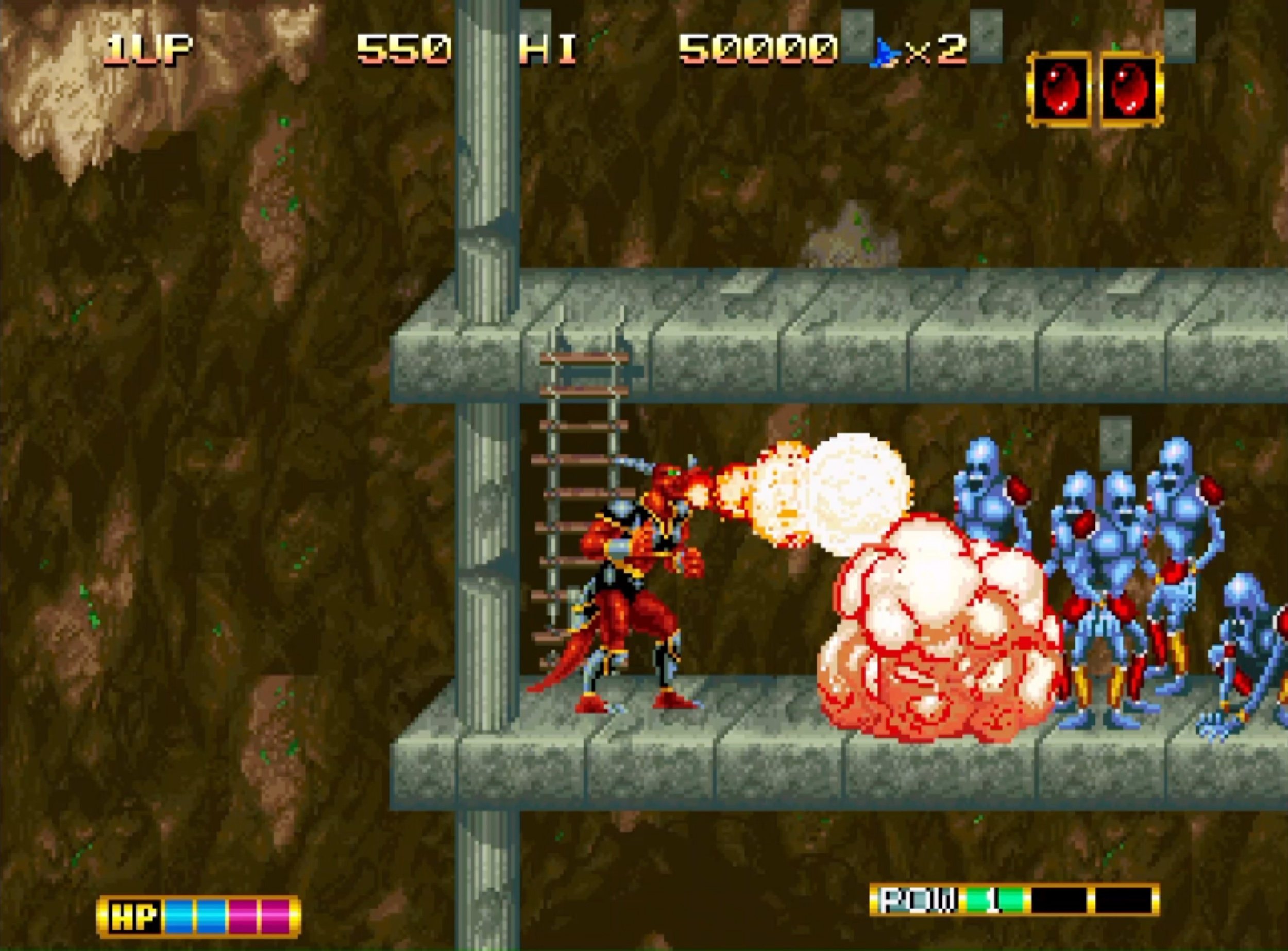 Ein roter Krieger feuert auf blaue Gegner auf einer Plattform vor einer Höhlenwand.