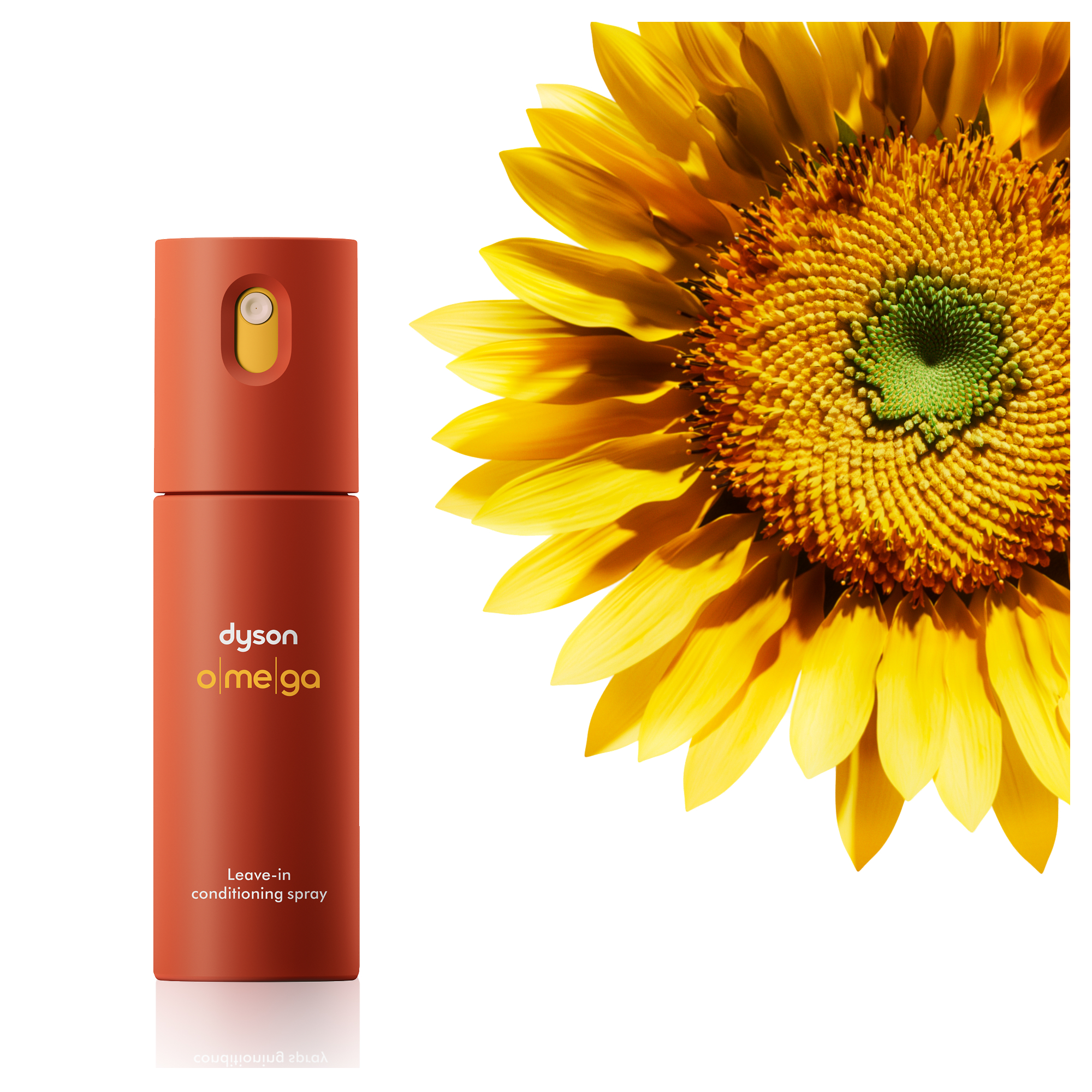 Ein oranger Dyson Omega Leave-in Conditioner mit einem Sonnenblumenkopf auf weißem Hintergrund.