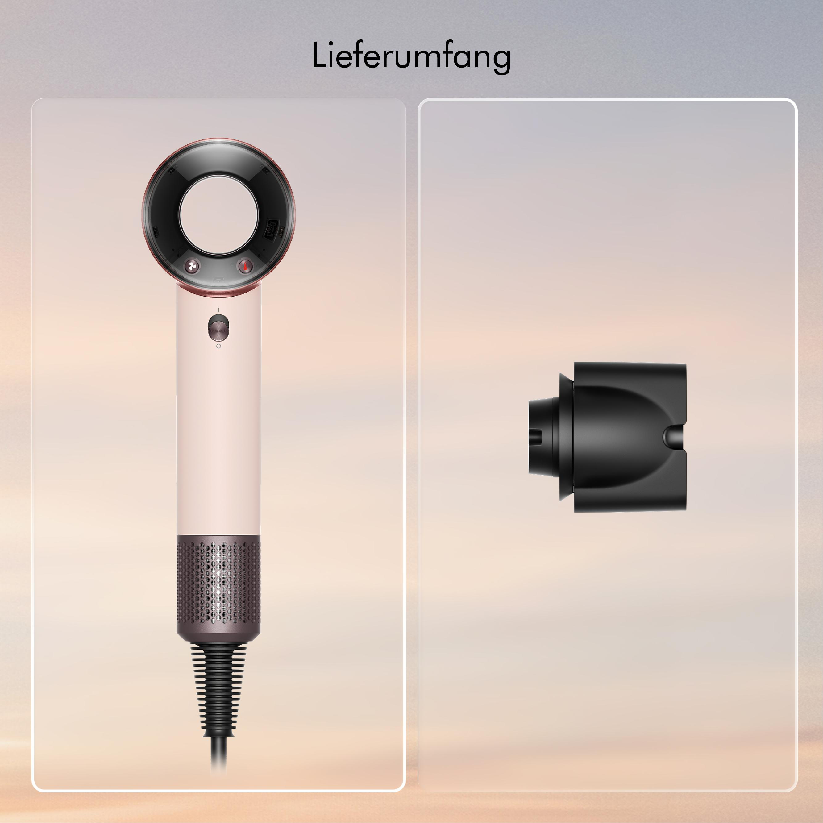 Ein heller Haartrockner mit einem schwarzen Aufsatz daneben.
