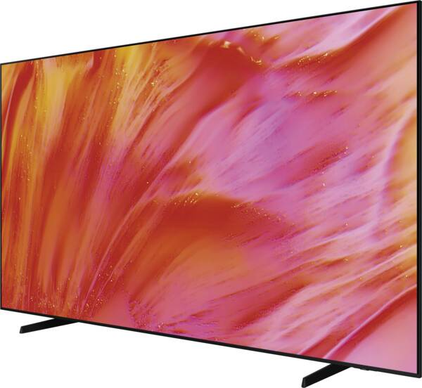 Een moderne flatscreen-tv met een kleurrijke, abstracte achtergrondafbeelding.