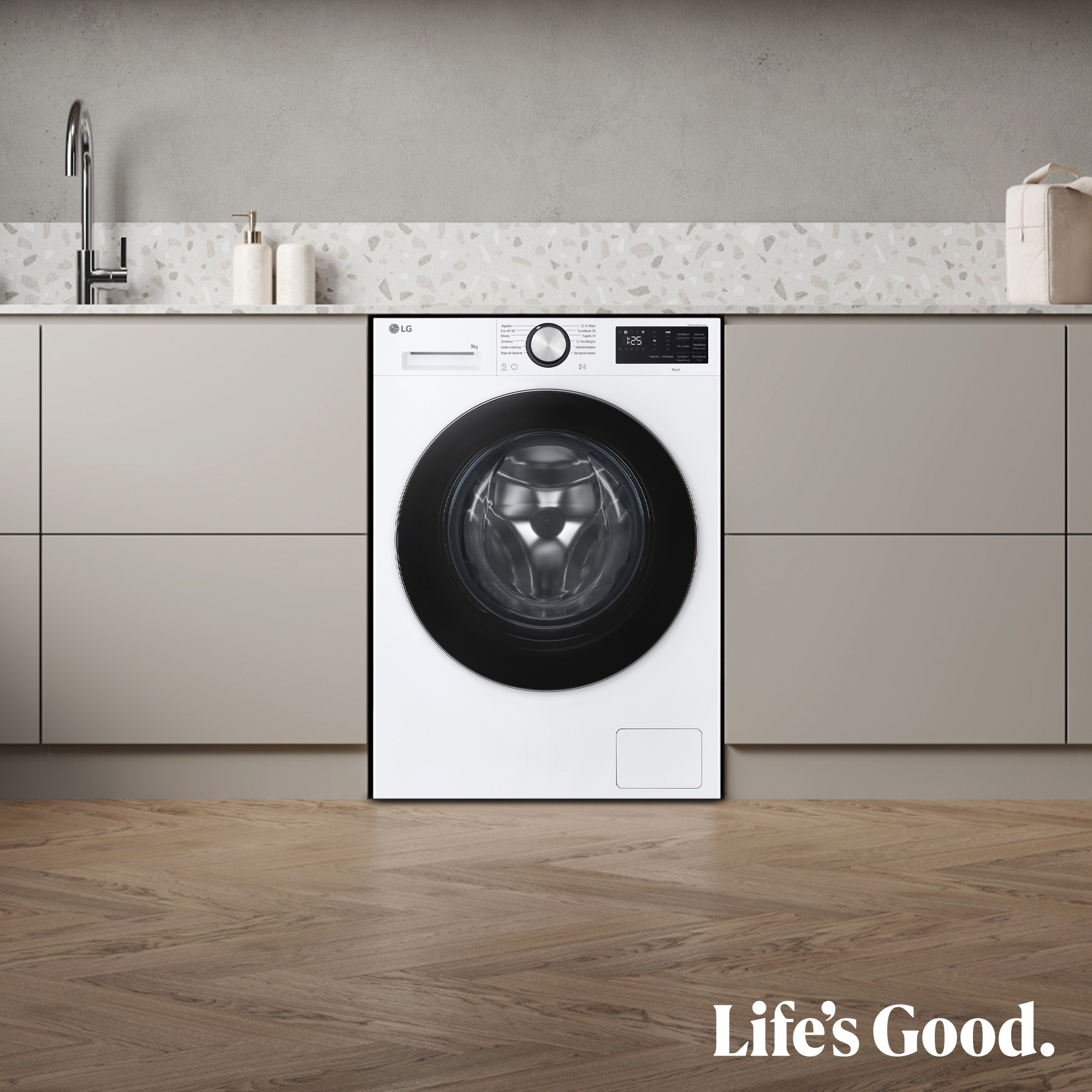 Una lavadora LG blanca con puerta negra en una cocina moderna.
