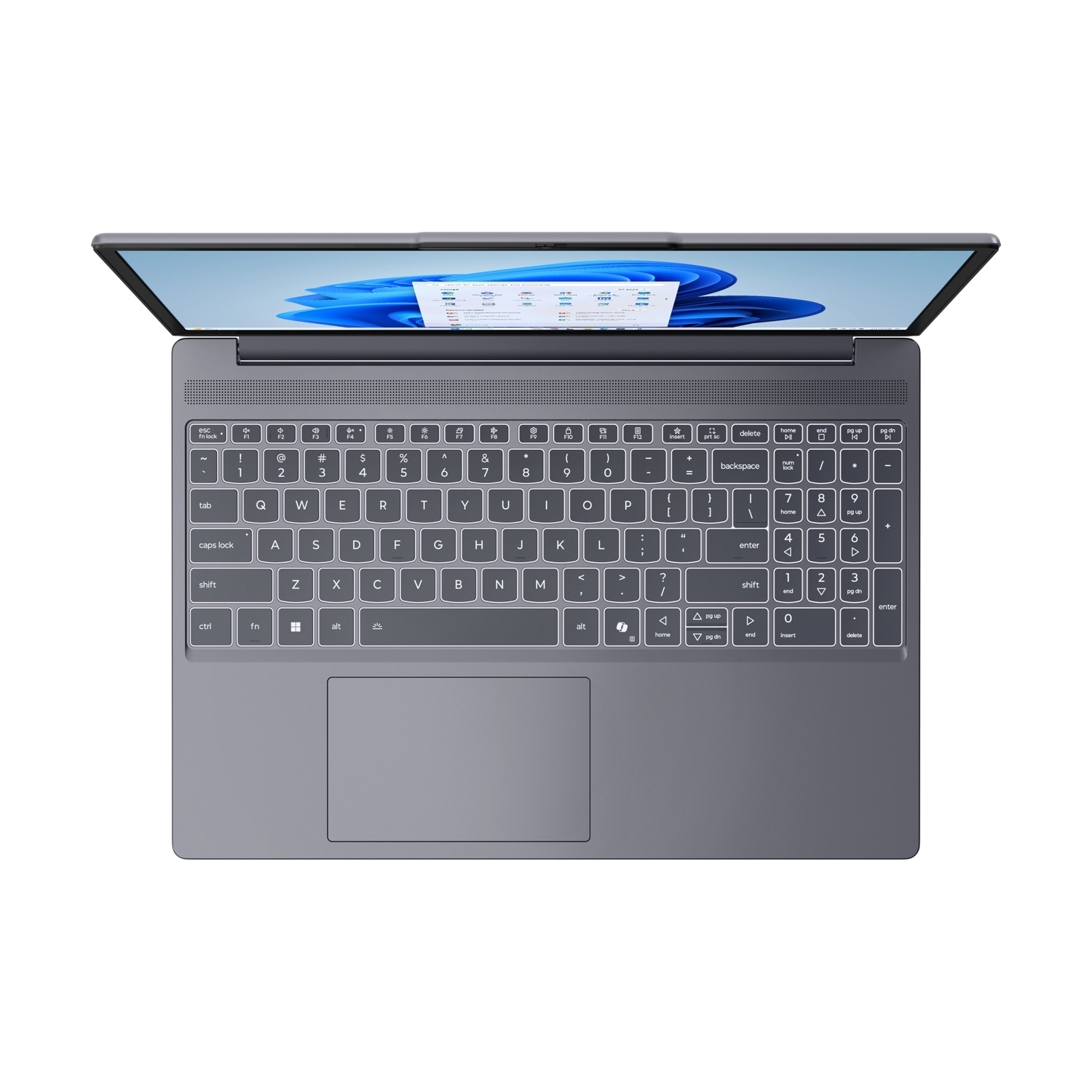 Un laptop grigio è aperto, mostra uno sfondo colorato del desktop sul suo schermo.