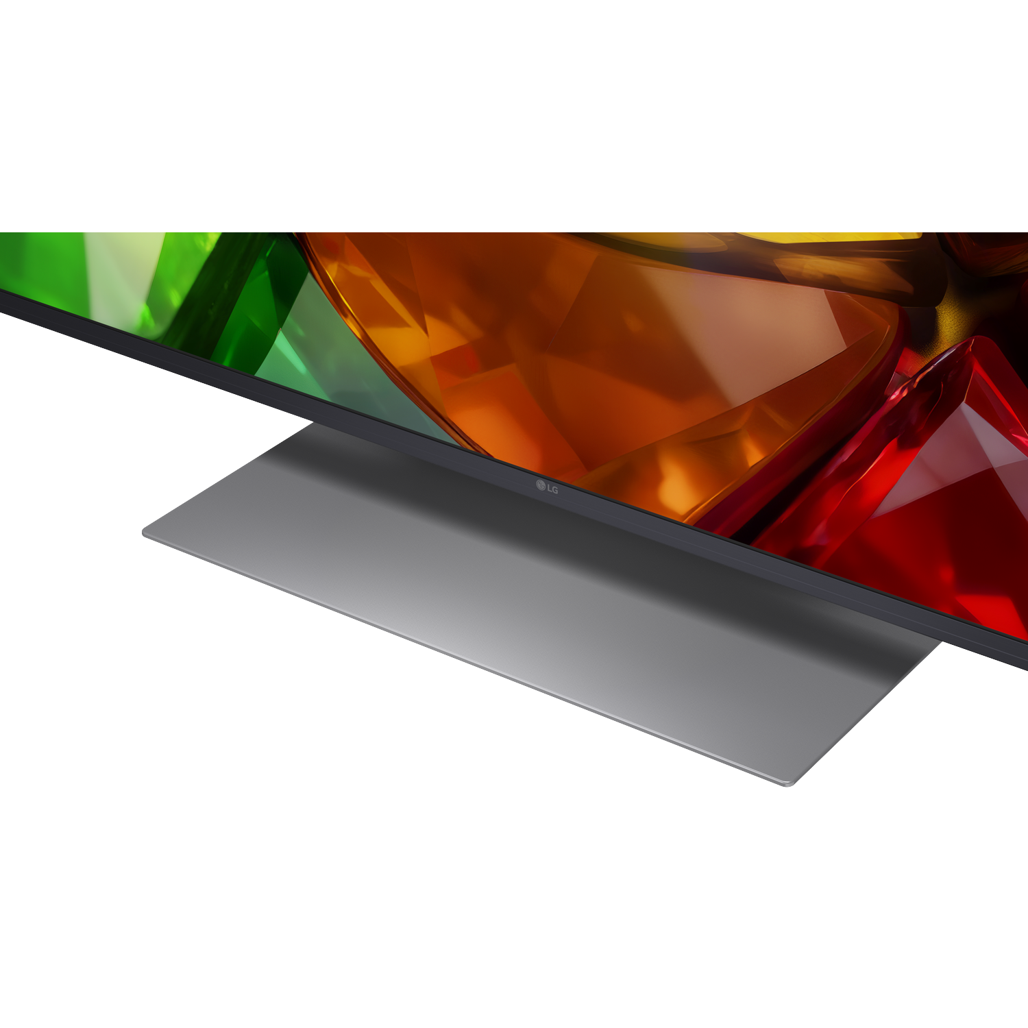 Een moderne tv op een grijze standaard met een kleurrijke abstracte achtergrond, met levendige rode en groene tinten.