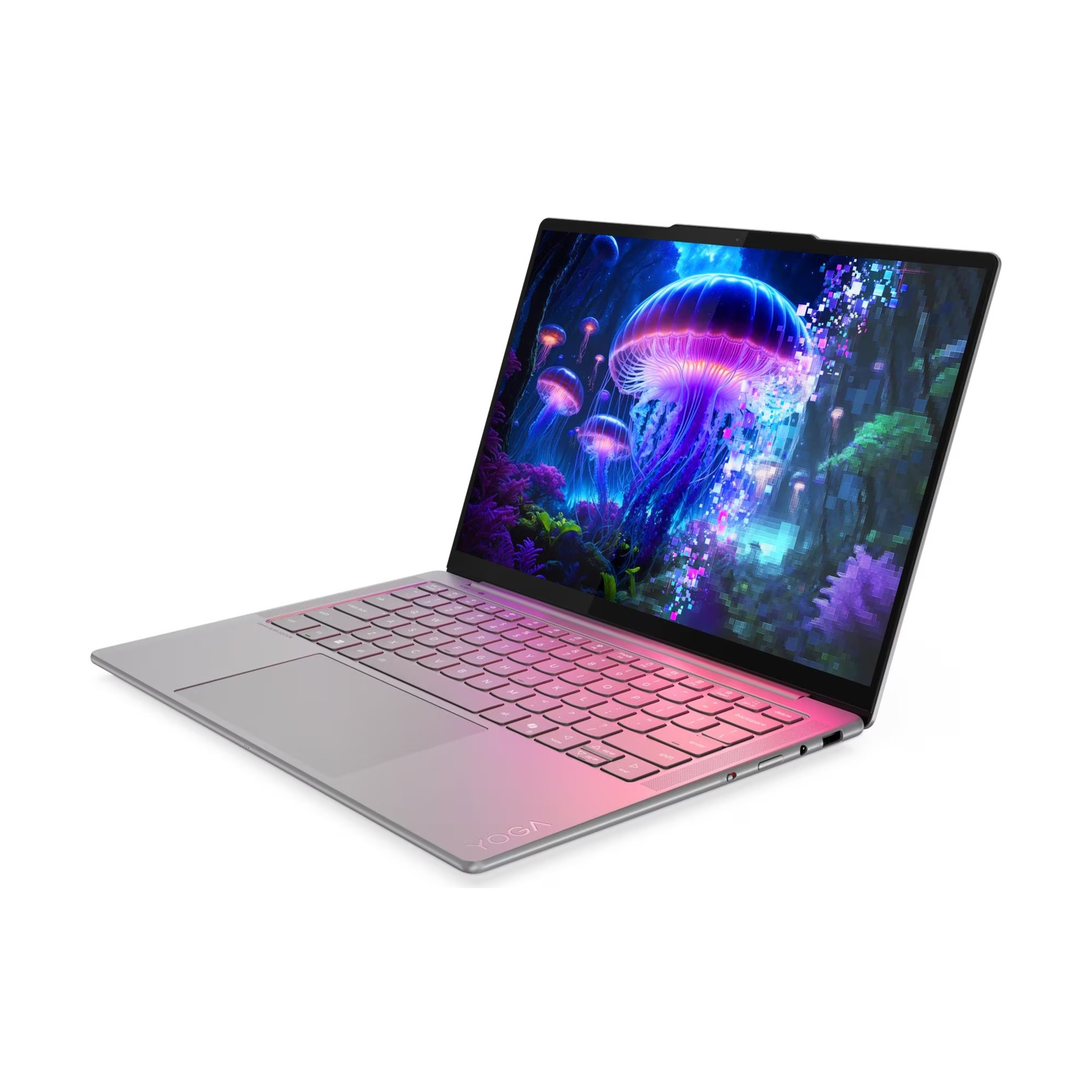 Un laptop argentato aperto mostra uno sfondo di meduse colorate.