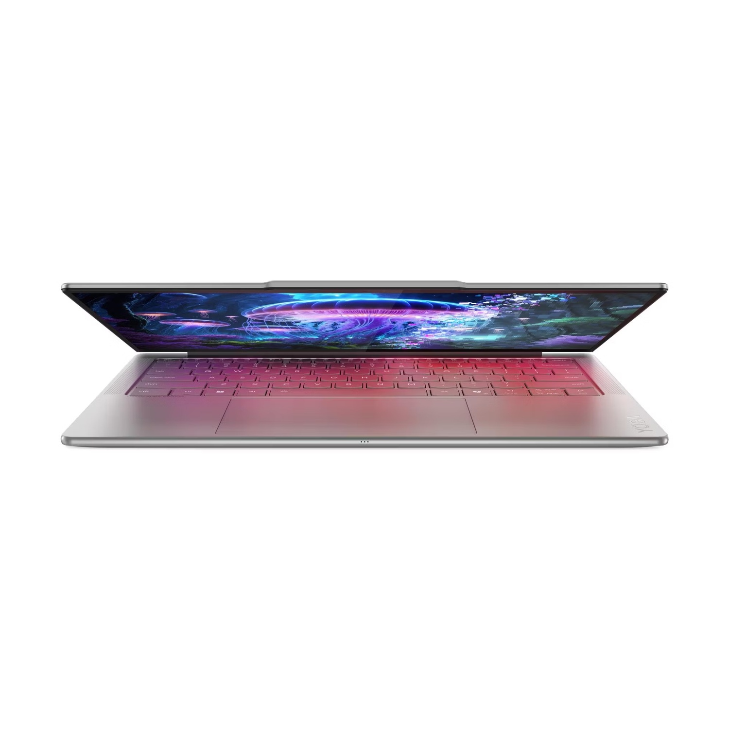 Un laptop aperto mostra uno sfondo colorato di meduse sullo schermo.