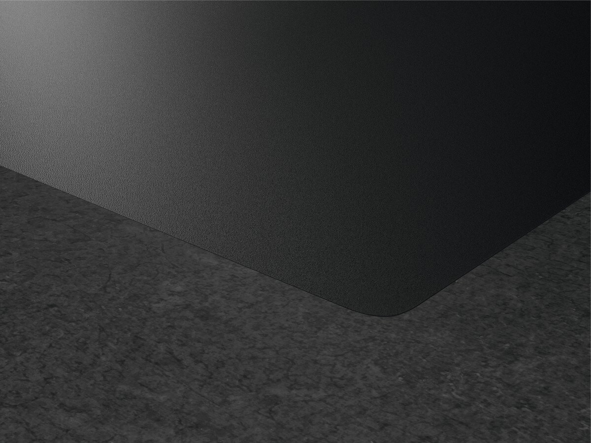 Una superficie texturizada negra se une a una textura oscura similar a la piedra.