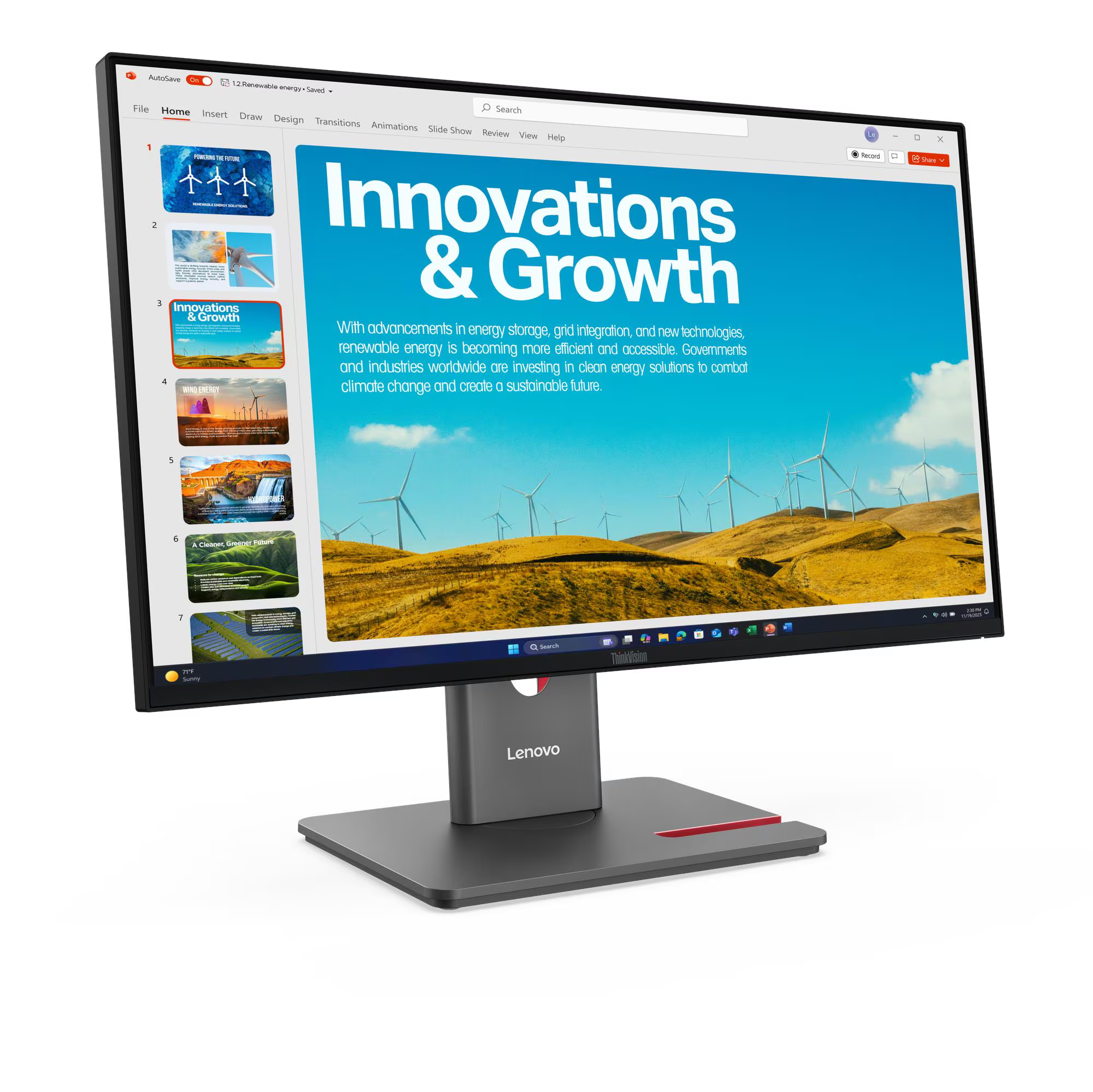 Egy számítógép monitor megújuló energiáról szóló prezentációt mutat szélkerekekkel.