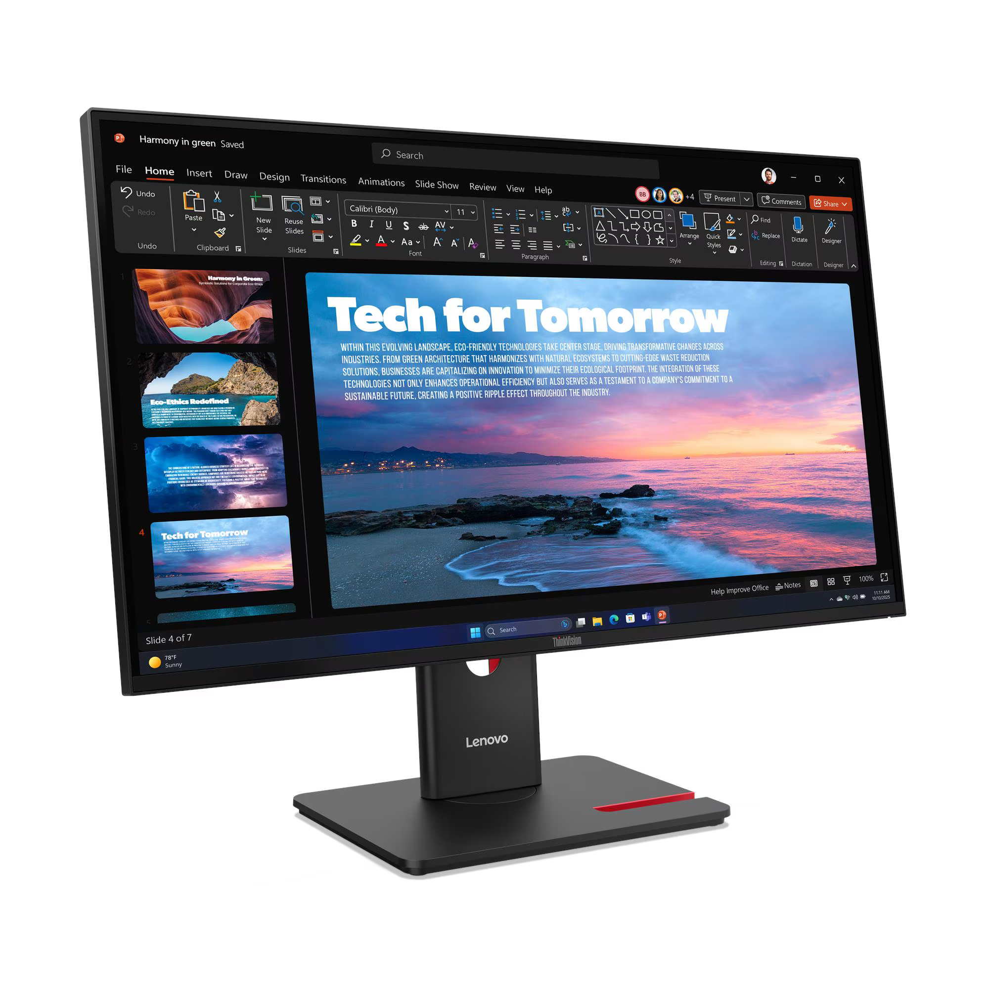 Számítógép monitoron látható egy prezentáció naplementével az óceán felett, címe: „Tech for Tomorrow”.