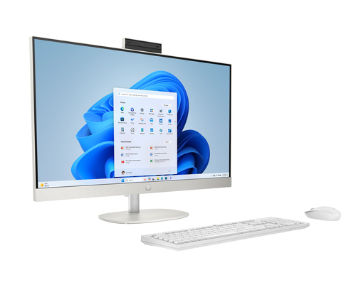 Un ordenador todo en uno blanco con teclado y ratón sobre fondo blanco.