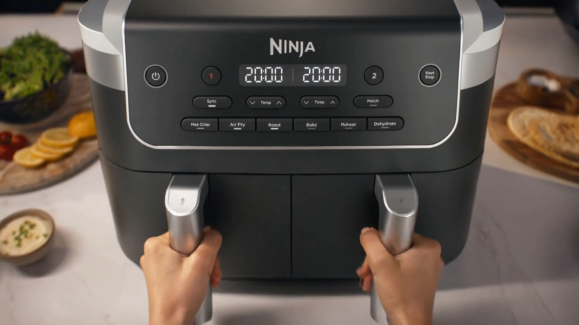 Una freidora de aire doble Ninja negra con pantalla digital y botones de control.