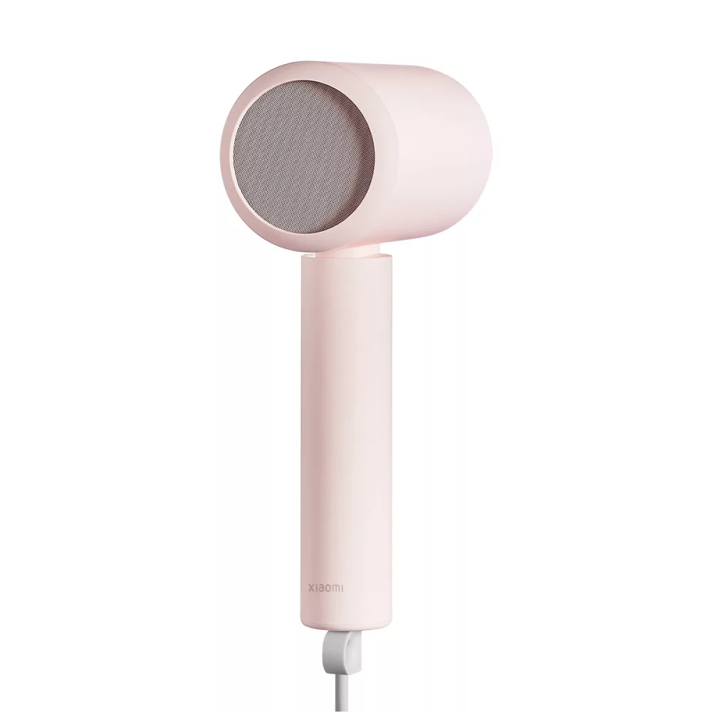 Egy rózsaszín Xiaomi hajszárító hálós ráccsal a fúvókán.