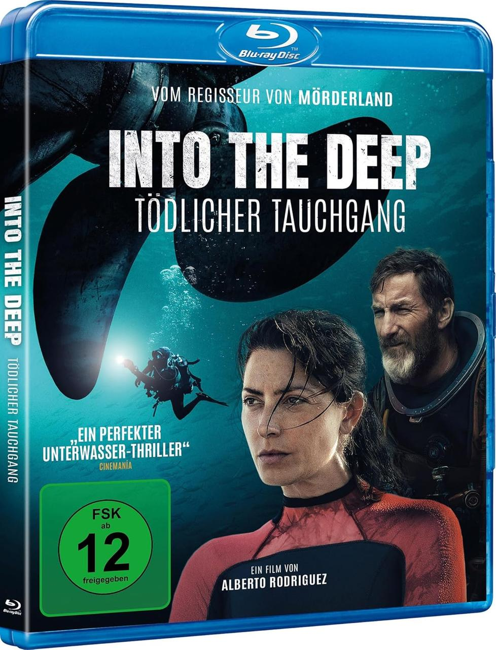 Blu-ray Cover: Taucher, ein Mann und eine Frau im Vordergrund, ein Hai im Hintergrund.