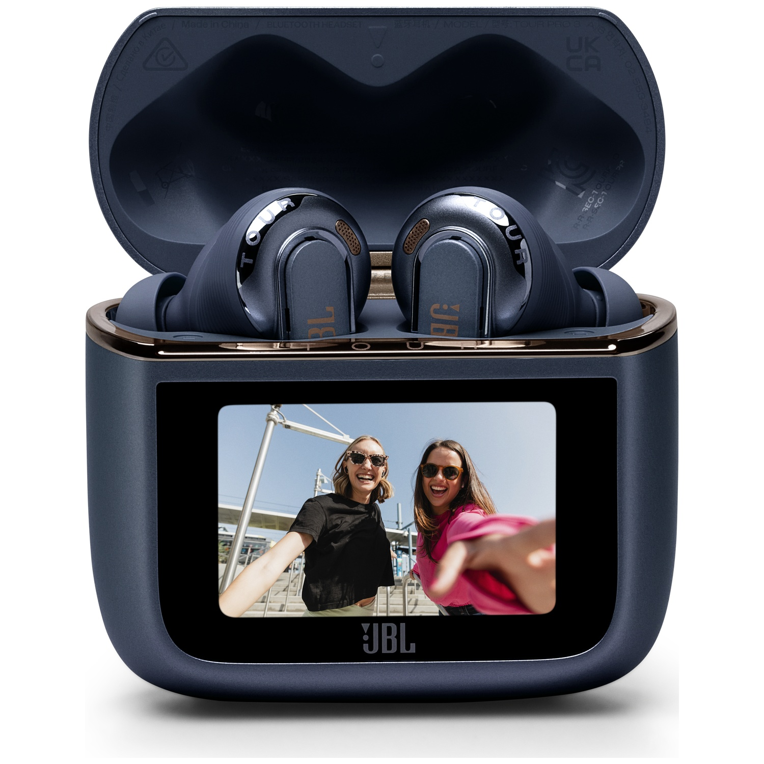 Dark blue earbuds in a charging case with a small screen showing two women.