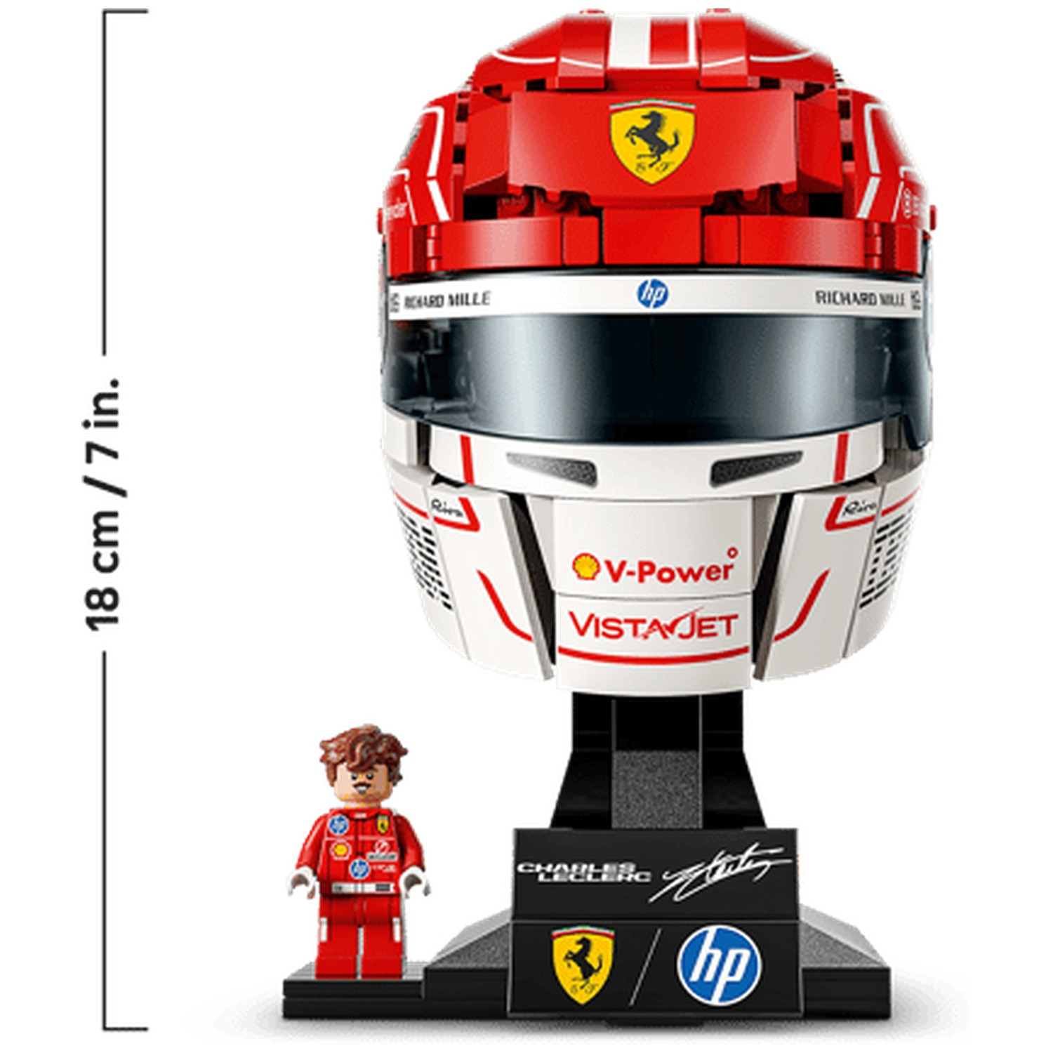 Red Lego F1 helmet on stand with minifigure. 18cm tall.