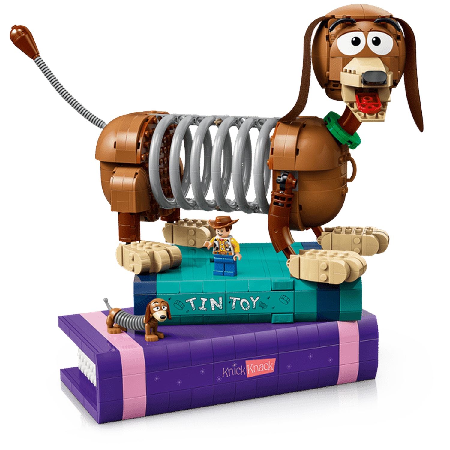 LEGO Slinky Hond met Woody en een kleine Slinky op boeken.
