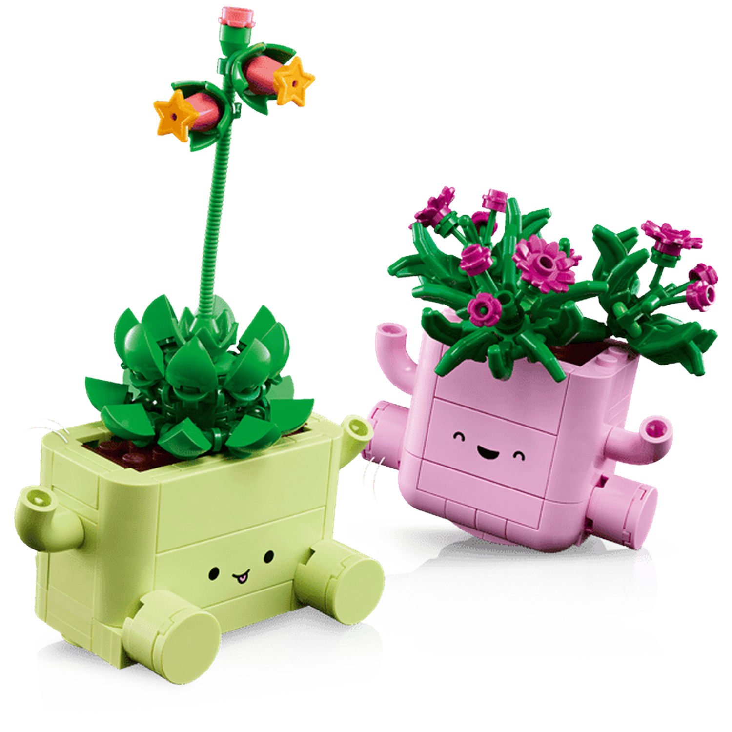 Twee Lego plantenbakken met gezichten. Eén is lichtgroen met een vetplant en stervormige bloemen. De ander is roze met groene bladeren en kleine roze bloemen.
