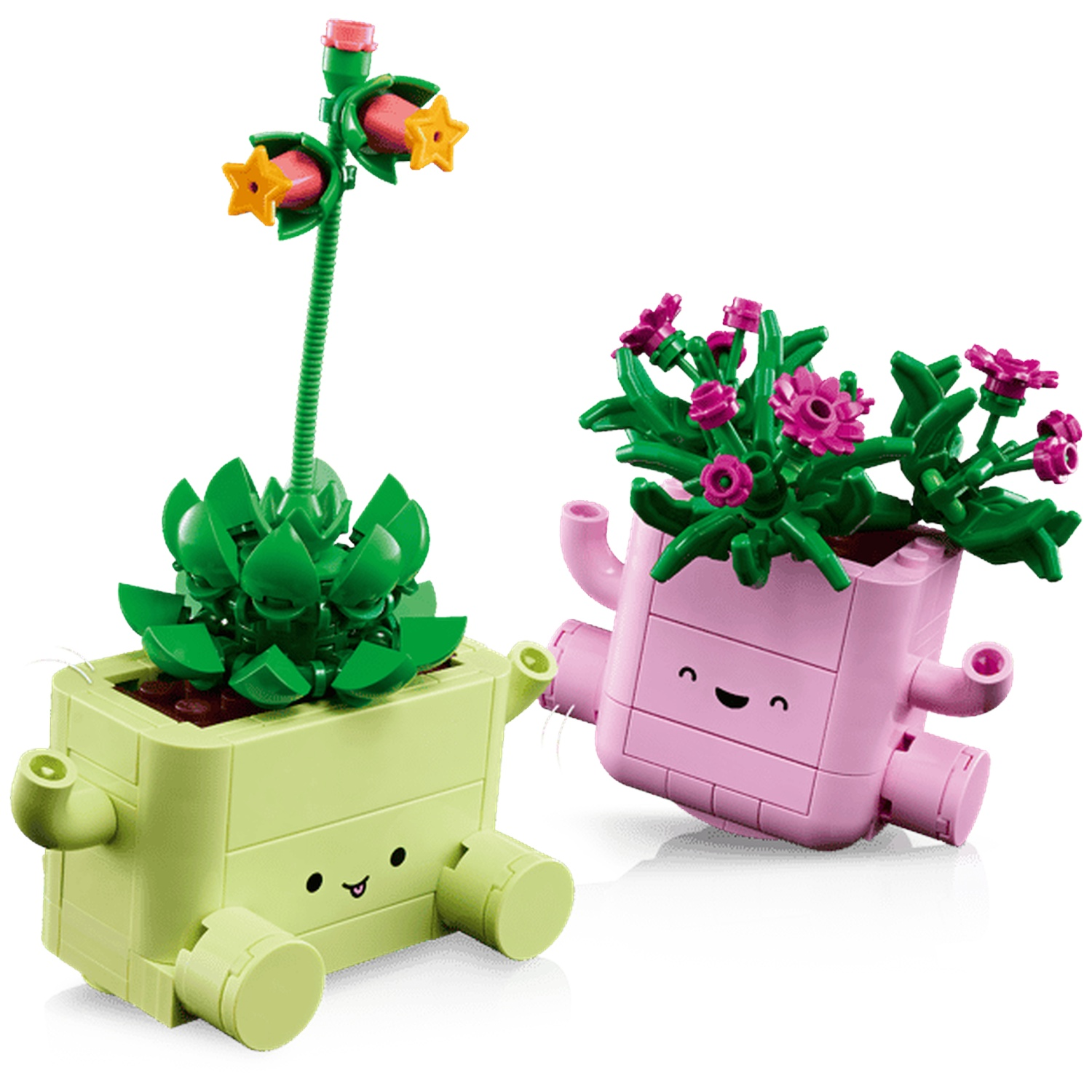 Two Lego brick planters with cute faces. One green, one pink, holding brick plants.