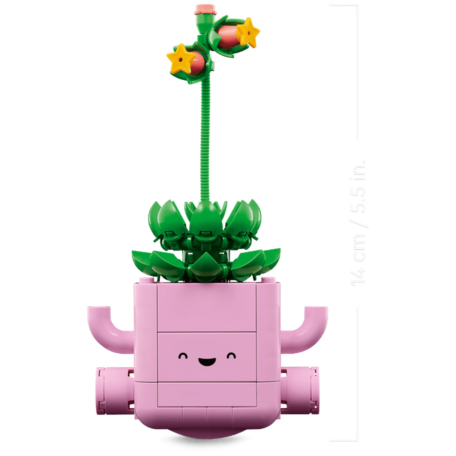 A pink Lego planter with a smiling face holds a green plant with yellow stars.