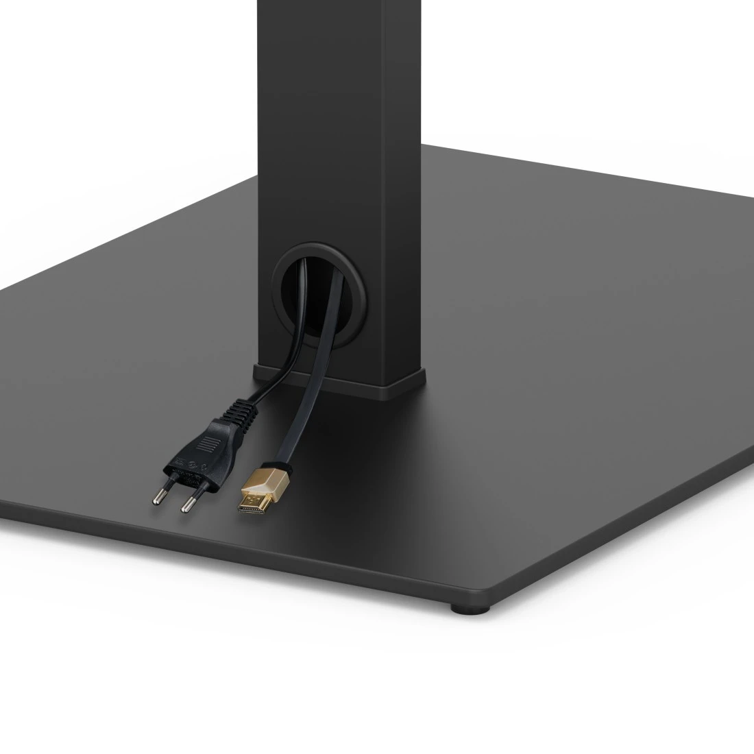 Cordon d'alimentation noir et câble HDMI sortent d'un support noir. Fond blanc.