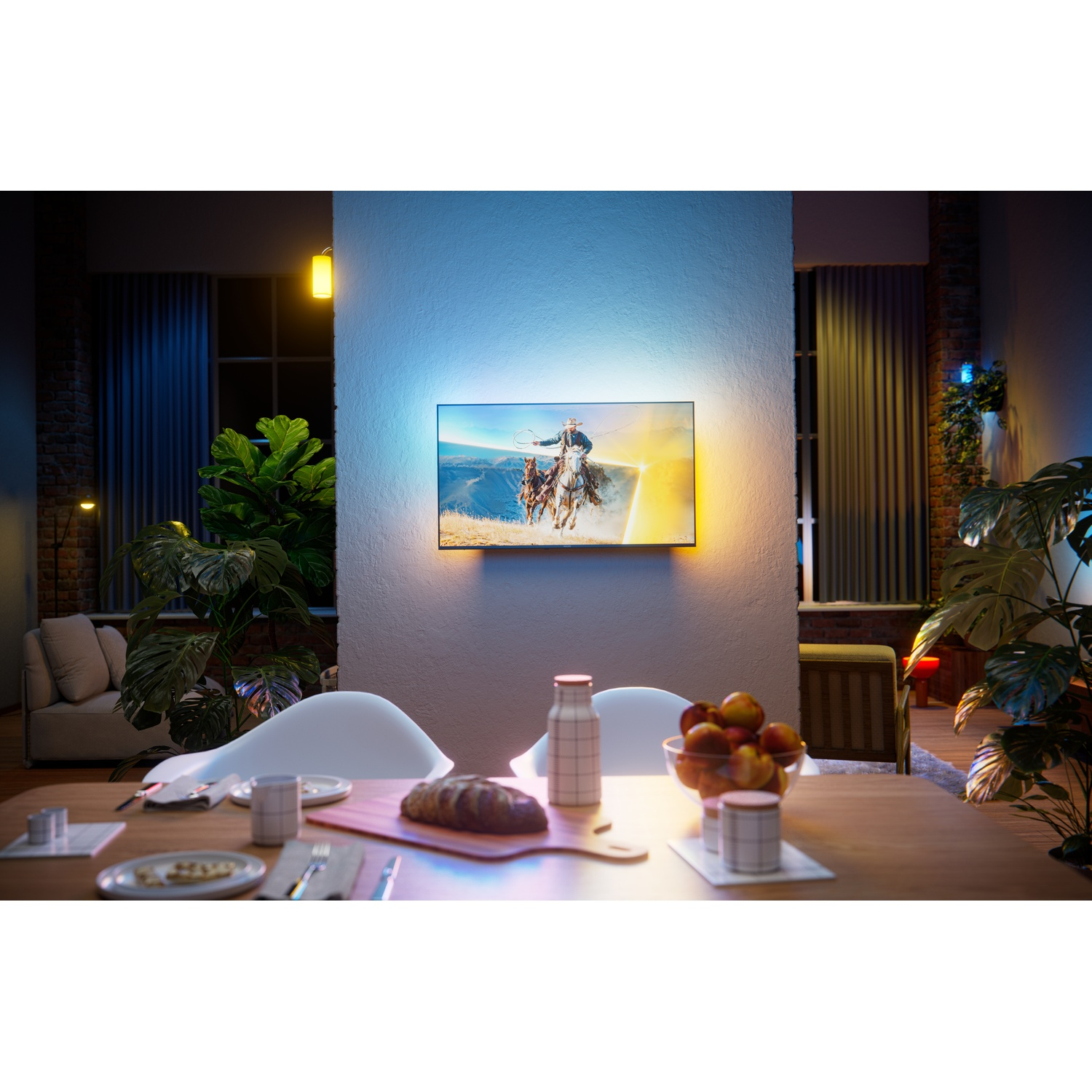 A TV displays cowboys on horses, lit by blue and yellow light in a room.