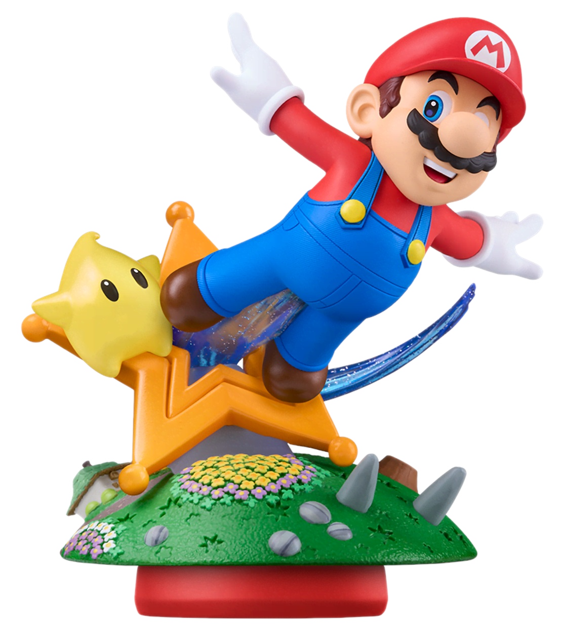 Mario jedzie na gwieździe, z kwiatami i kamieniami na zielonym pagórkowatym terenie.