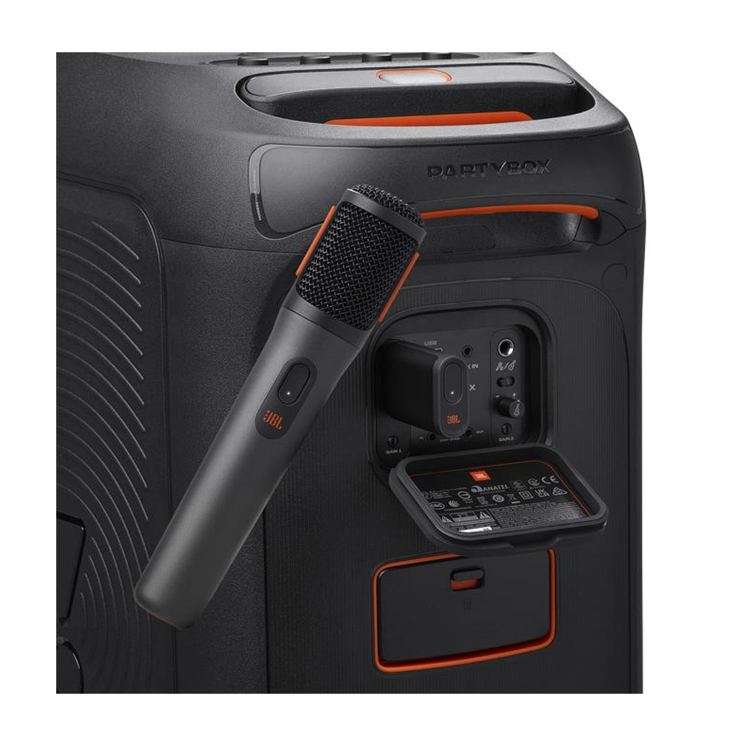 Cassa JBL "PARTYBOX" nera con microfono e porte arancioni.