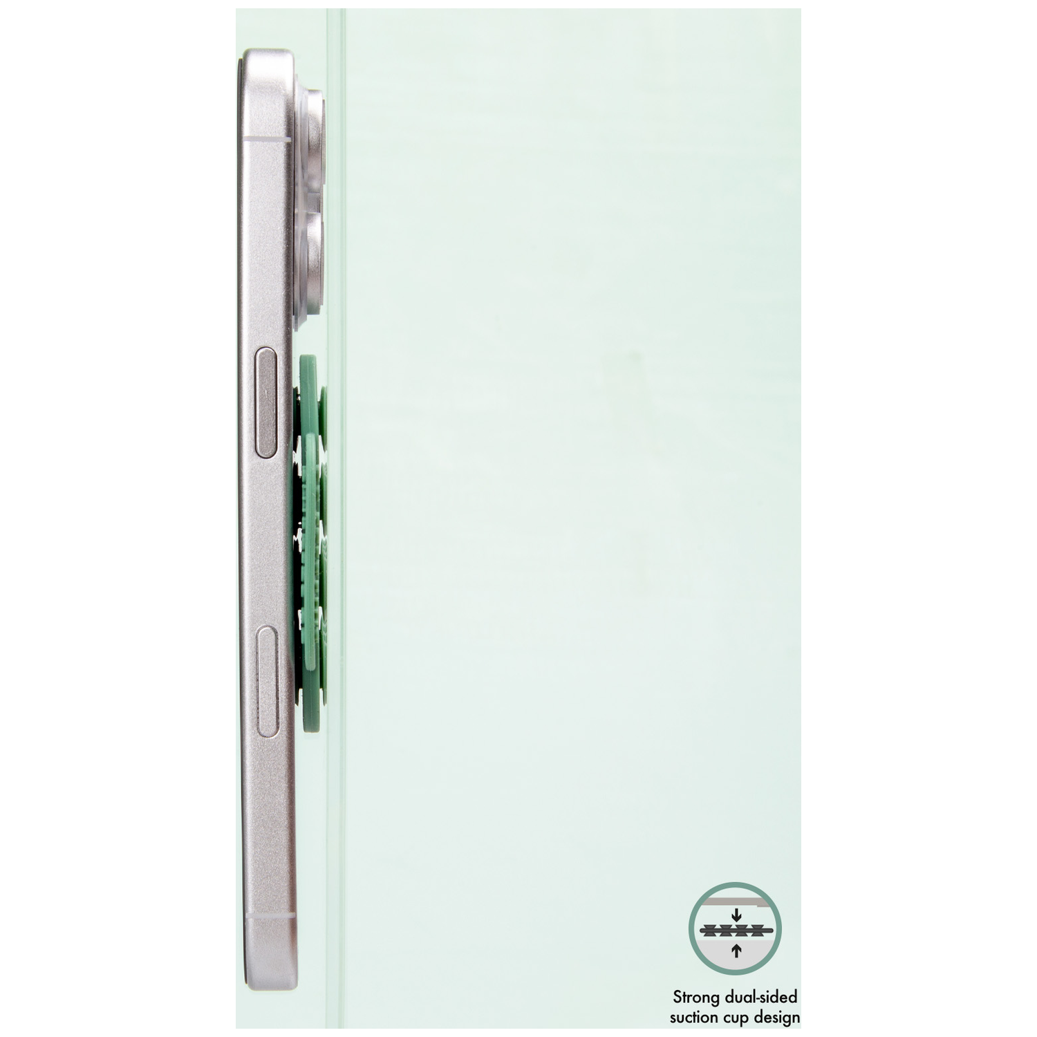 Silver smartphone with green suction cup accessory in profile on a light green background.