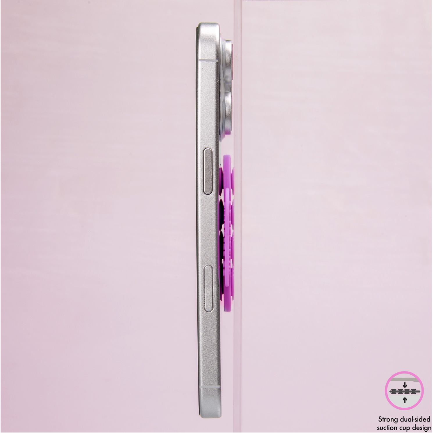 A silver smartphone with a purple grip on the back against a light background.
