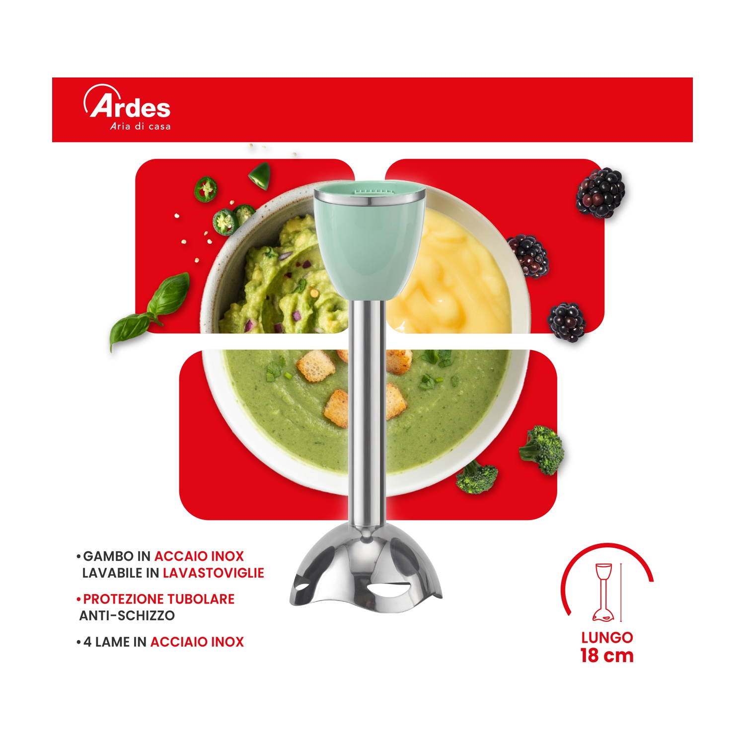 Un frullatore a immersione verde poggia su una ciotola di zuppa di verdure e guacamole.