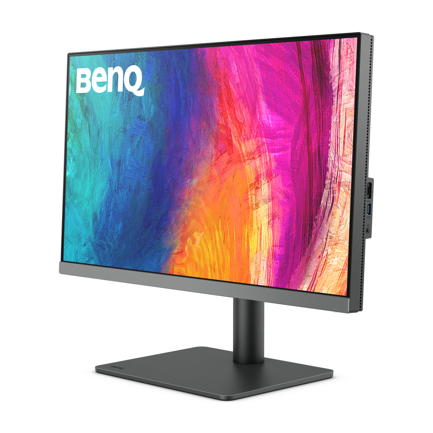 Un moderno monitor BenQ con uno sfondo astratto colorato e porte laterali.