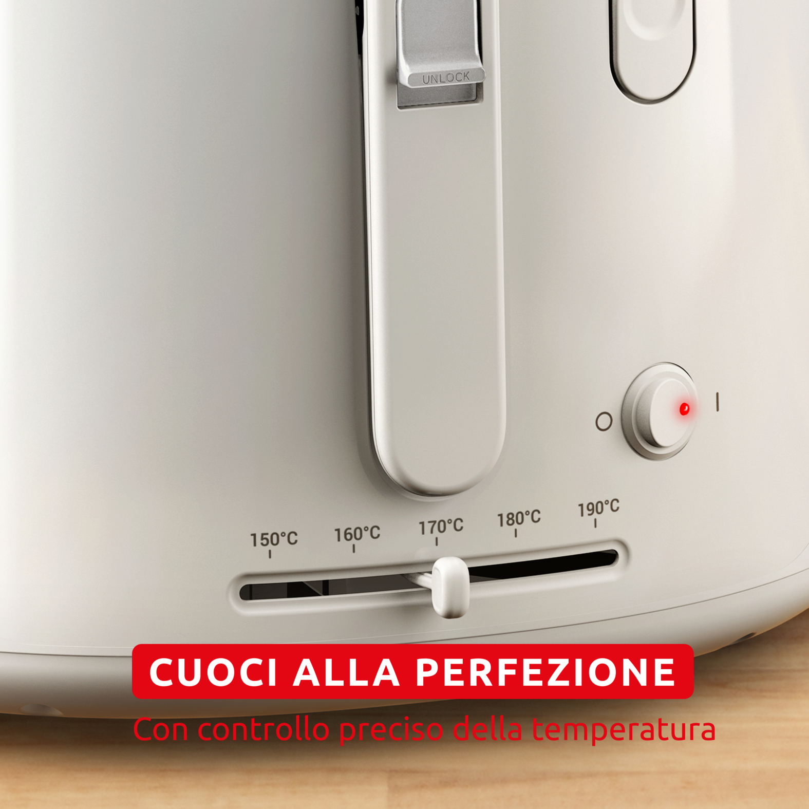 Un tostapane bianco con controllo temperatura e spia rossa.