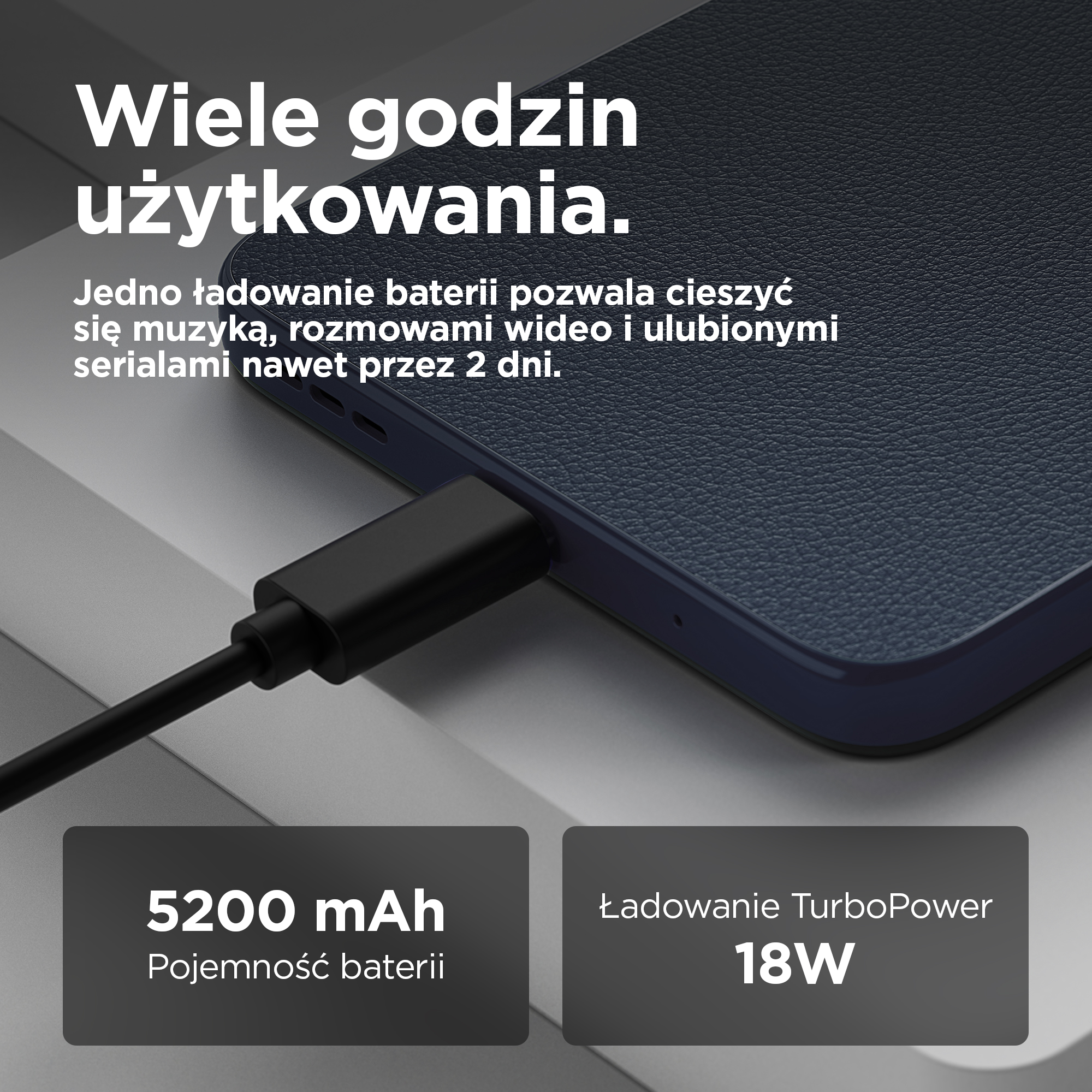 Kabel USB-C ładuje ciemny smartfon z baterią 5200 mAh i mocą 18W TurboPower.