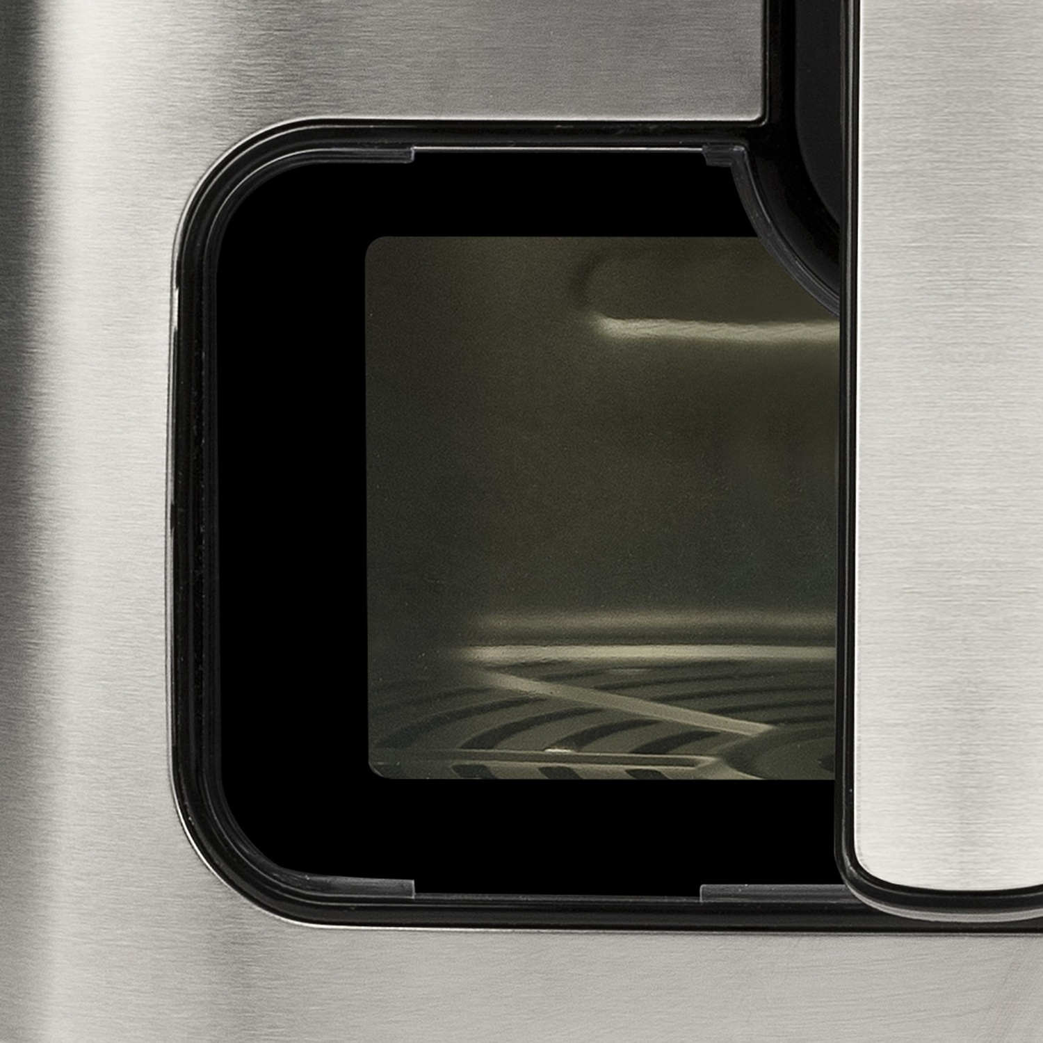 Porta in acciaio inox con finestra sull'interno di un forno.