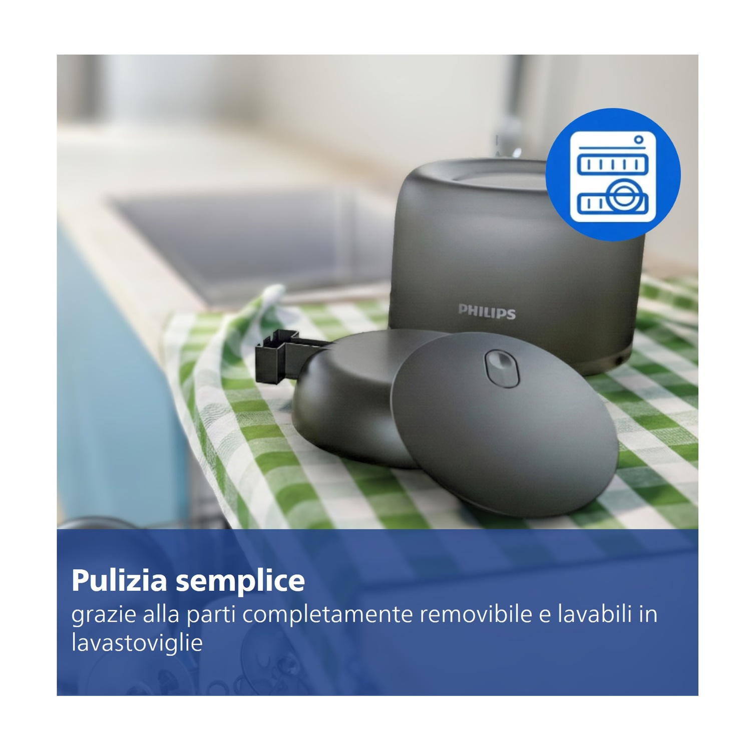 Contenitore e coperchio Philips grigi su strofinaccio a quadretti vicino lavello.