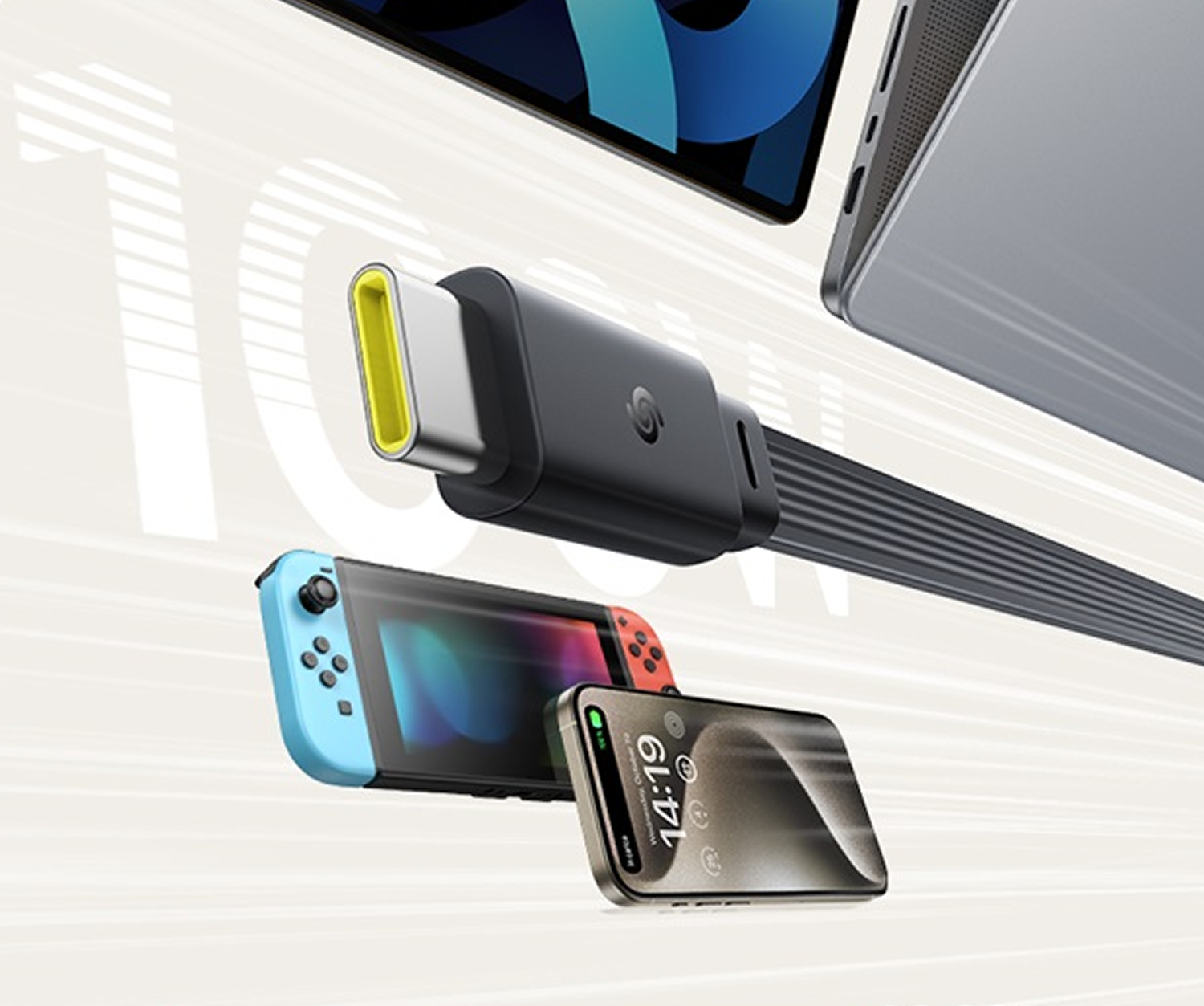 Un cable USB-C negro conecta una tablet, una consola de juegos y un smartphone.