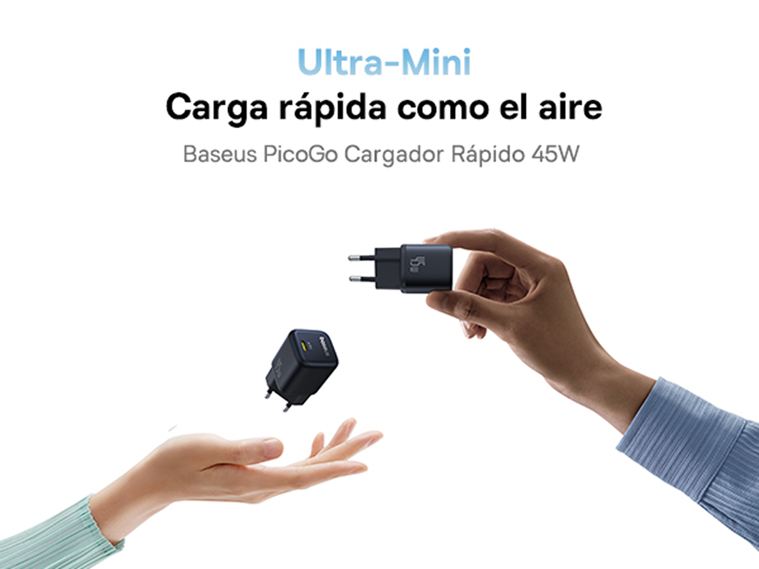 Una mano sostiene un cargador negro, otra mano lo atrapa.