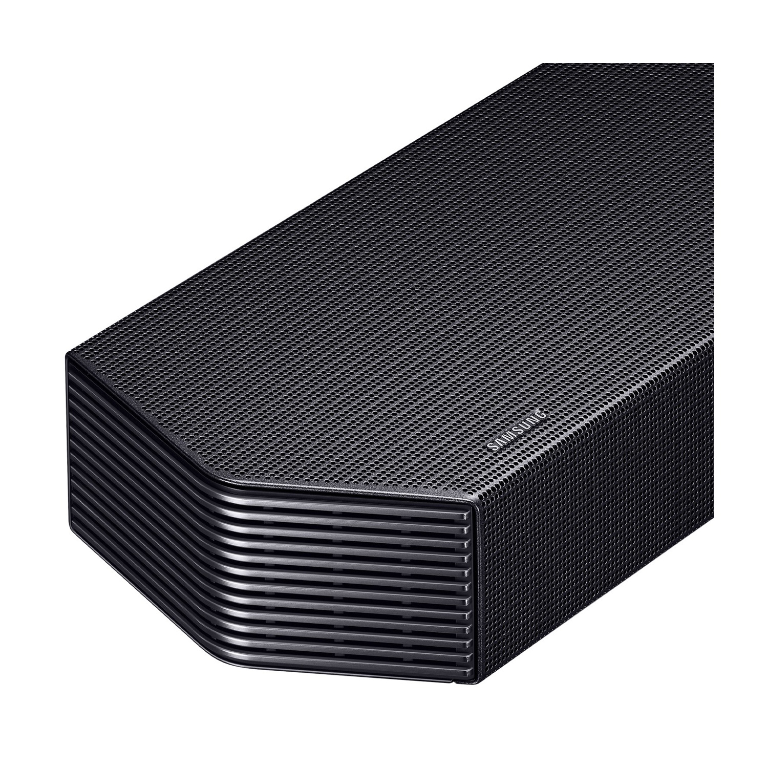 Soundbar Samsung nero con parte superiore forata e lati a listelli.