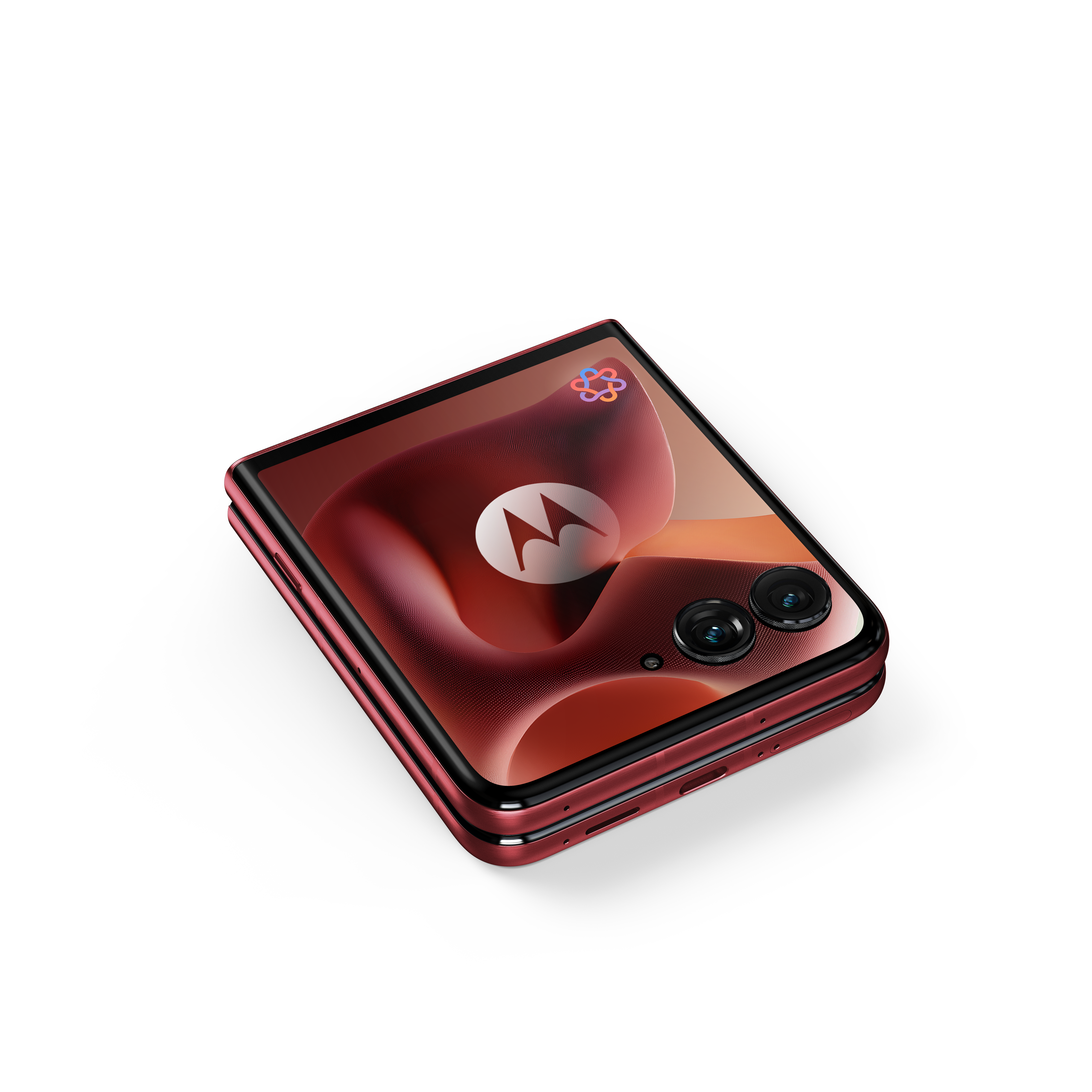 Czerwony telefon składany z logo Motorola i dwoma aparatami na ekranie.