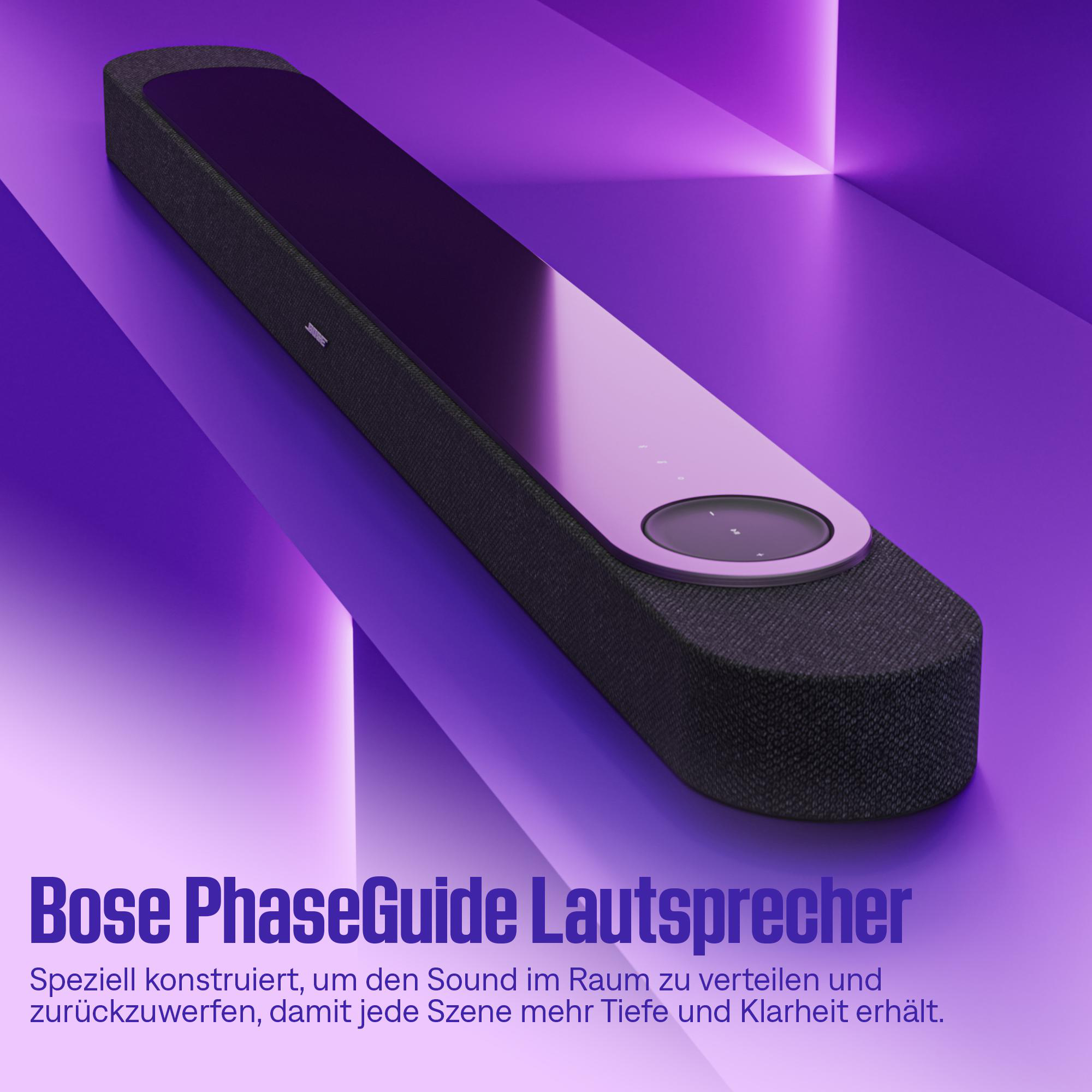 Schwarzer Bose Lautsprecher mit Glasoberfläche vor lila Hintergrund.