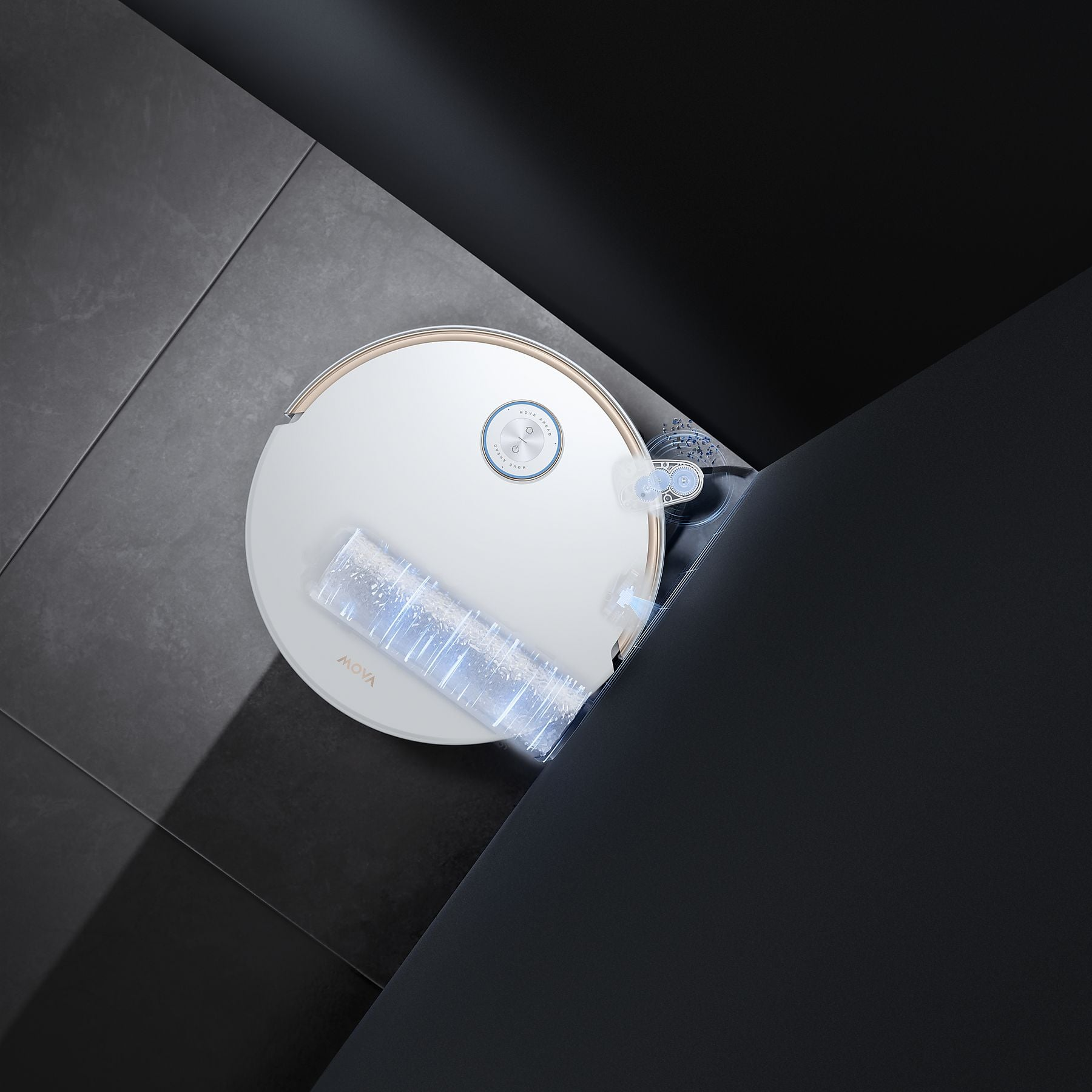 Un robot aspirapolvere bianco pulisce su un pavimento scuro con luce blu.