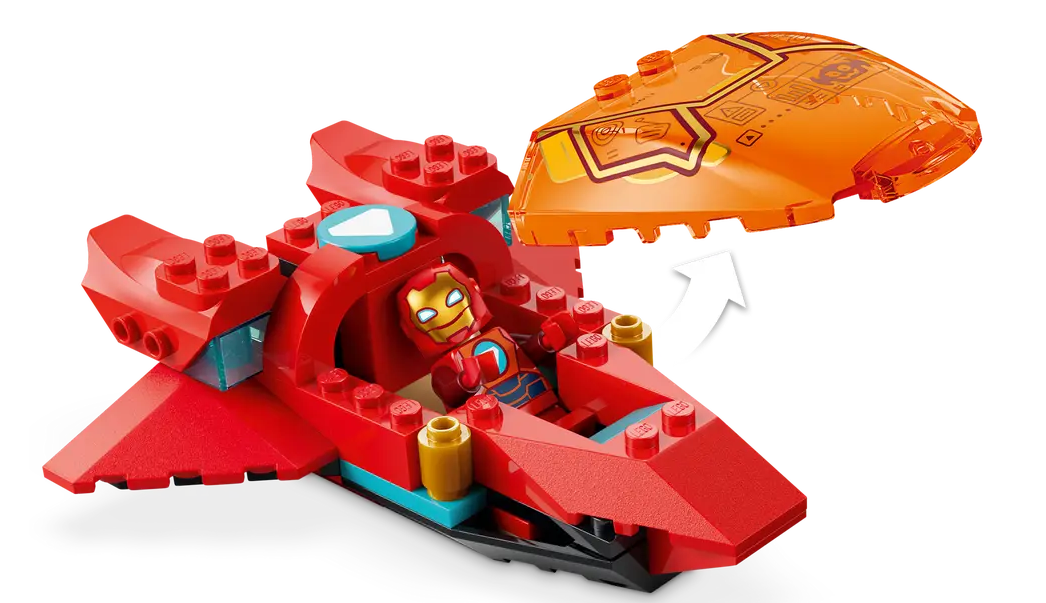 Iron Man sitzt in einem roten Lego-Jet. Eine durchsichtige orange Haube wird abgenommen.