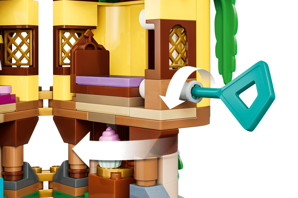 Ein LEGO-Spielzeugbaumhaus mit türkisfarbenem Schlüssel und weißen Pfeilen.