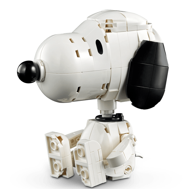 Ein weißer Lego-Snoopy sitzt, mit schwarzer Nase und einem schwarzen Ohr.