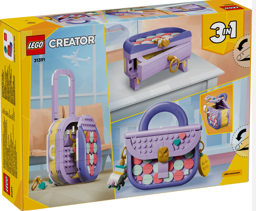Lego Creator Set mit drei violetten und gelben Reiseutensilien: Koffer, Schmuckkästchen, Handtasche.
