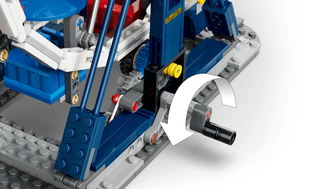 Detailansicht eines blauen und grauen Lego-Modells mit Zahnrädern und einem Pfeil.