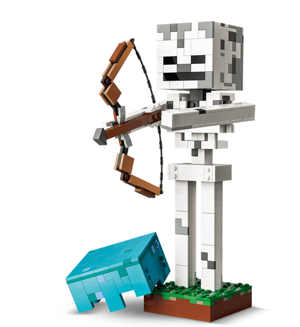 Ein Lego-Skelett mit Bogen zielt auf einen blauen Lego-Ghast.